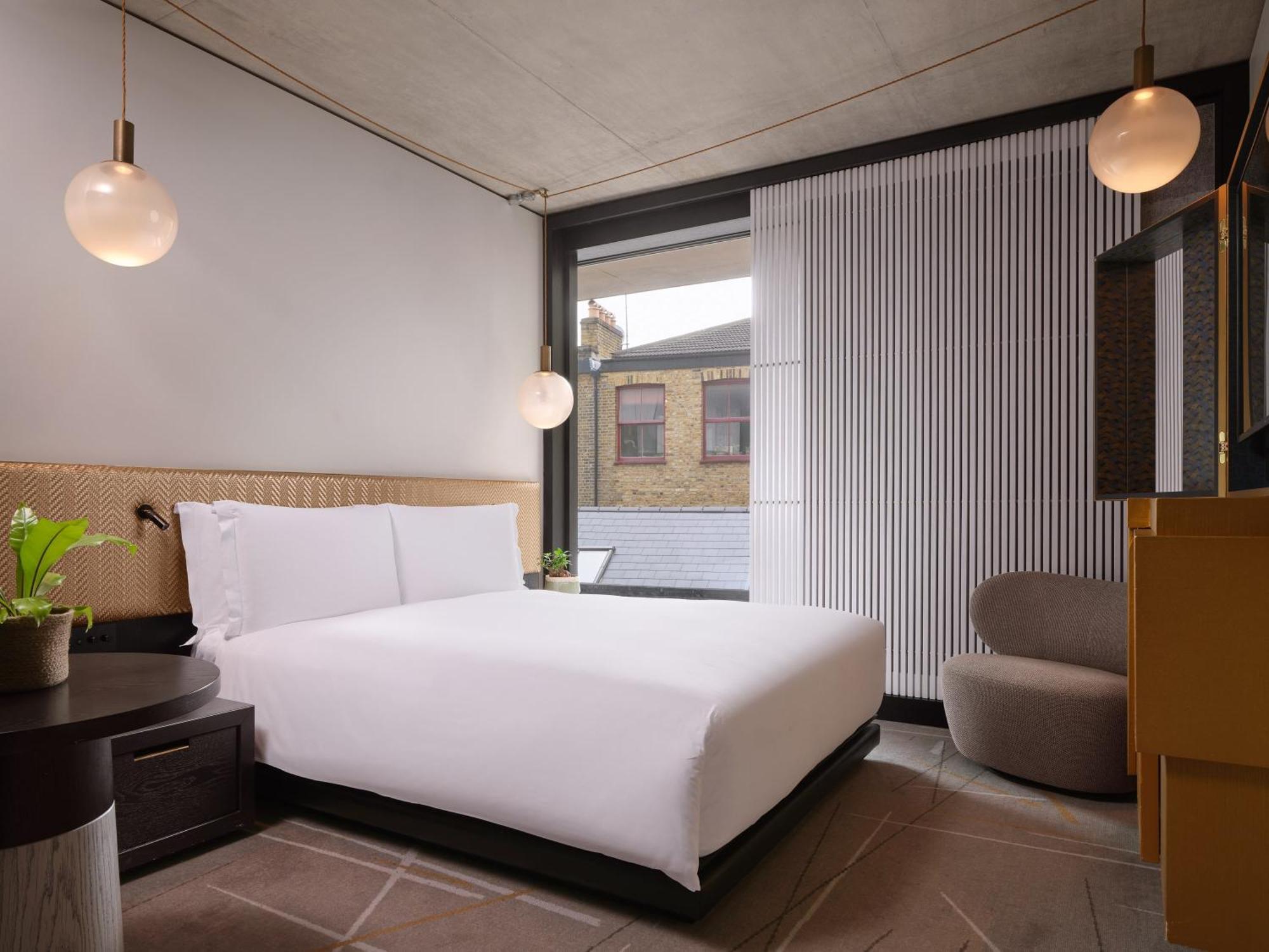 Nobu Hotel London Shoreditch Exterior photo A bedroom at the hotel